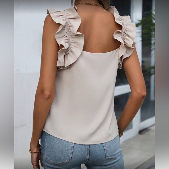 Elegant ruffle sleeveless blouse - Picture 3 of 7